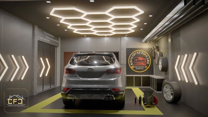 Auto detailing bay with hexagon ceiling lighting.