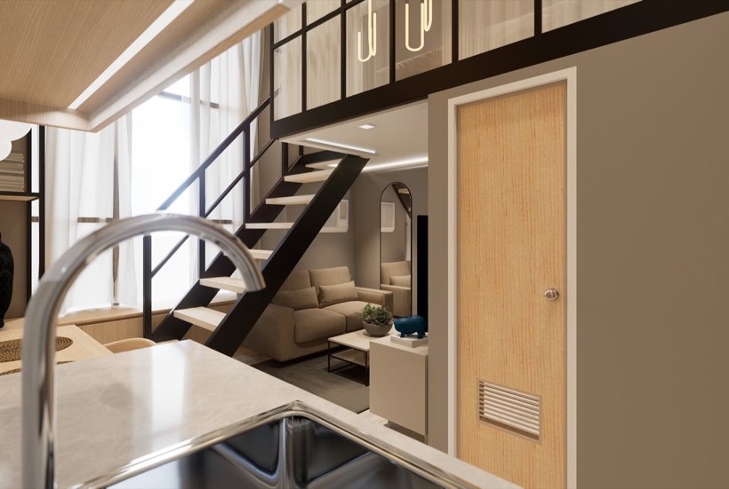 Loft unit looking past the kitchen to the steel stair.