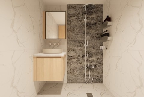 Marble-tiled bathroom.